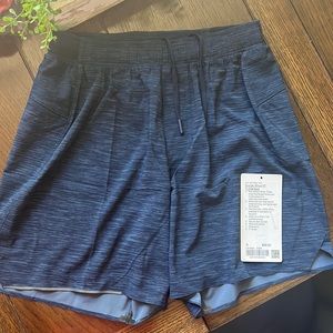 Brand new (tags off) Lululemon Surge Shirt 6” Linerless